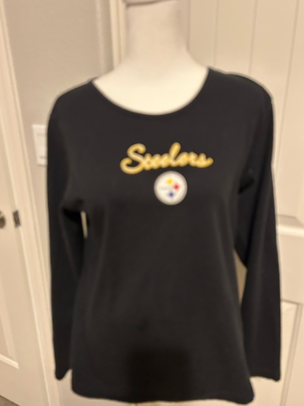NFL Steelers Black Long Sleeve Crewneck Top with Gold Script